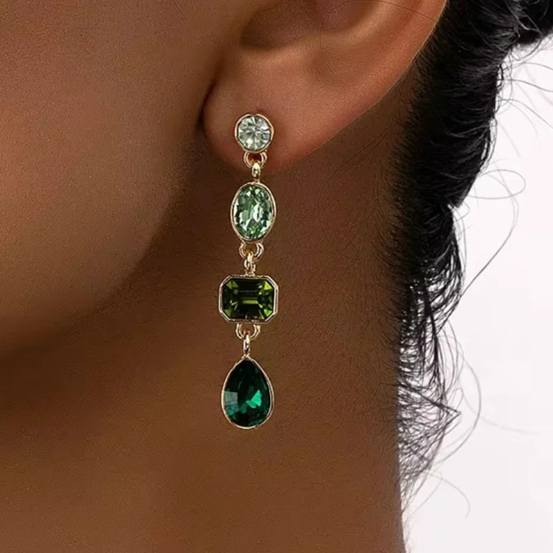 Gouden Oorbellen met Groene Kristallen - Hip