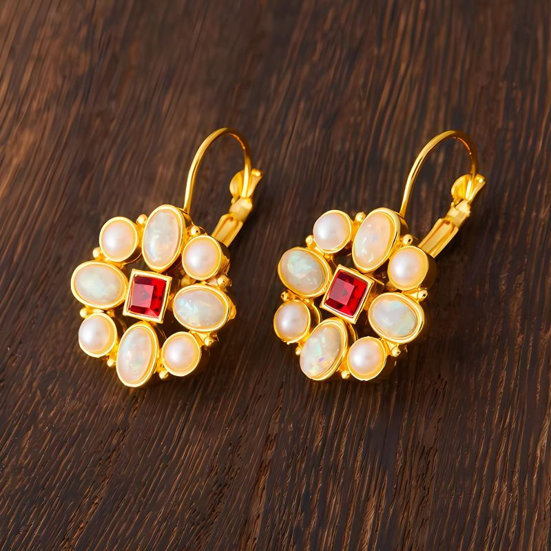 Gouden Bloem Druppeloorbellen met Opaal - Kyana