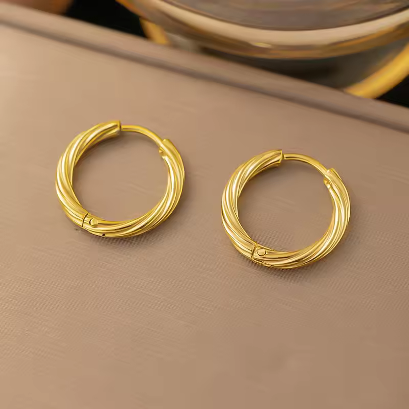 Gouden Gedraaide Hoepeloorbellen - Charlotte