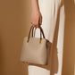 Emmerbag voor dames in generfd leer met dubbel handvat - Emilia