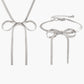 Maak uw stijl compleet met de elegante strik en kwastjes kettingen- en armbanden set